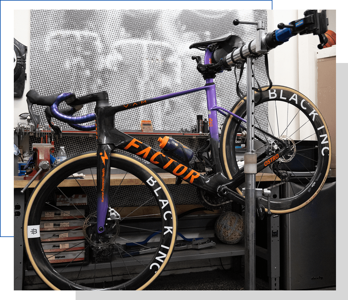 Bicycle on repair stand in garage