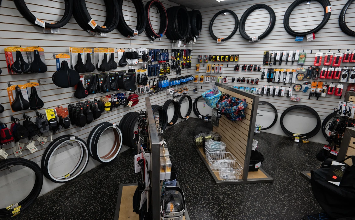 Bike tires and gear on store walls