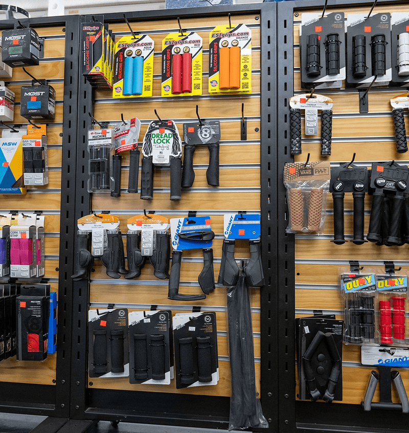 Cycling accessories organized on retail display.